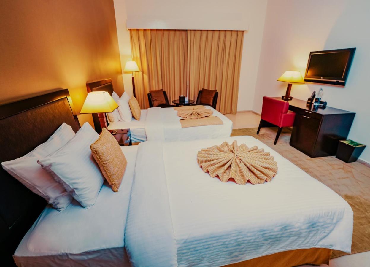 Villaggio Hotel Abu Dhabi Esterno foto